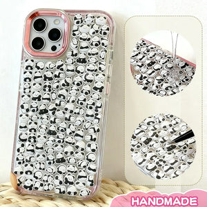 Finished display of handmade DIY phone case with full panda print, pink frame, and cute mini panda patterns