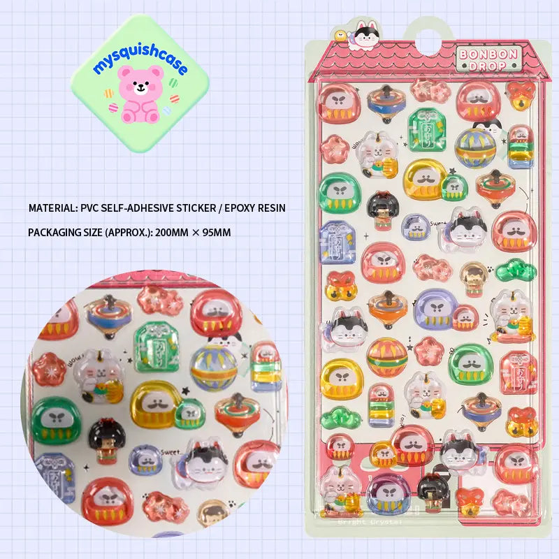Product display of Japanese daruma pet themed 3D crystal puffy sticker sheet, including material (PVC/epoxy resin) and packaging size (200mm×95mm), cute kawaii daruma and sushi stickers for planner and DIY craft decoration