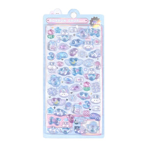 A blue retail sheet of premium Bonbon Drop Seal 3D puffy stickers with a dreamy celestial theme, featuring cute cartoon bunnies, hearts, milk bottles, and angel wings.