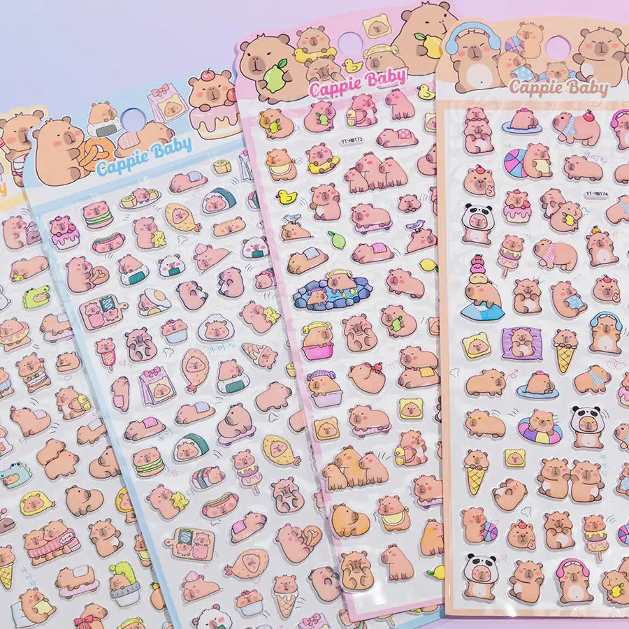 Multi-pack display of 3D puffy Capybara sticker sheets, featuring cute cartoon capybara characters in various poses, self-adhesive epoxy PVC stickers
