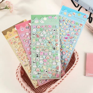 Multi-pack display of colorful mini animal 3D puffy sticker sheets, featuring cute designs in green, pink, blue, and beige
