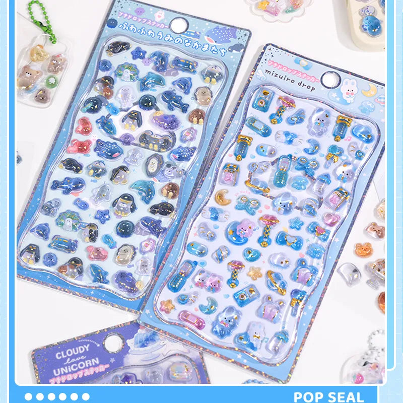 Collection of 3D crystal puffy sticker sheets with adorable ocean creature and pet designs, in blue color scheme
