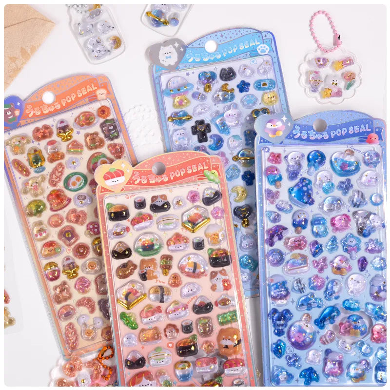 Collection of 3D crystal puffy sticker sheets with cute snack, pet, and ocean designs, in pink and blue color schemes
