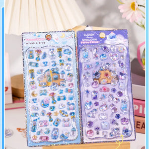 Handheld display of 3D crystal puffy sticker sheets with unicorn and cute character designs, in blue and purple color schemes

