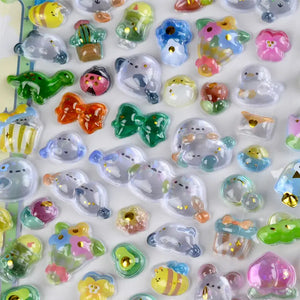 Close-up of 3D crystal clear stickers with adorable nature (cactus, dinosaur, flower) and pet designs, featuring glitter and gold foil effects, self-adhesive PVC epoxy stickers
