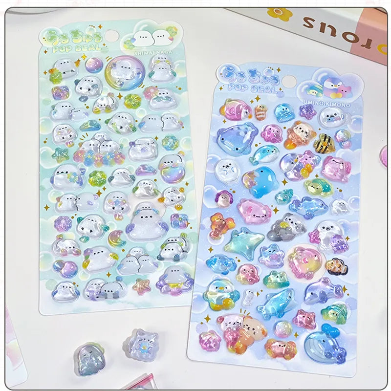 Collection of 3D crystal puffy sticker sheets with adorable ocean and ghost pet designs, in pastel blue and green color schemes
