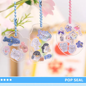 Decorative display of 3D crystal ocean stickers used for keychain DIY, featuring cute sea animal designs
