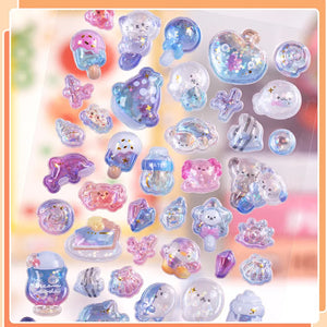 Close-up of 3D crystal clear stickers with adorable pastel pet and dessert designs, featuring glitter and iridescent effects
