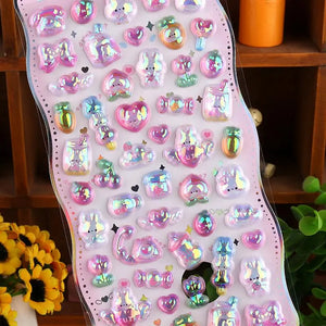 Close-up of 3D crystal clear pink "BONBON DROP" stickers with adorable iridescent pet, heart, and bunny designs, featuring holographic and glitter effects, self-adhesive PVC epoxy stickers
