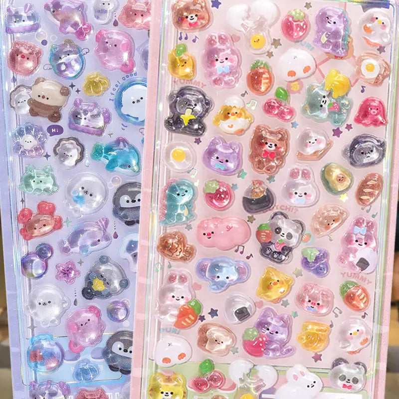 Scene display of pink "BONBON DROP" 3D crystal puffy sticker sheets, featuring adorable animal, panda, and fruit designs with holographic and glitter effects, ideal for planner and DIY craft decoration
