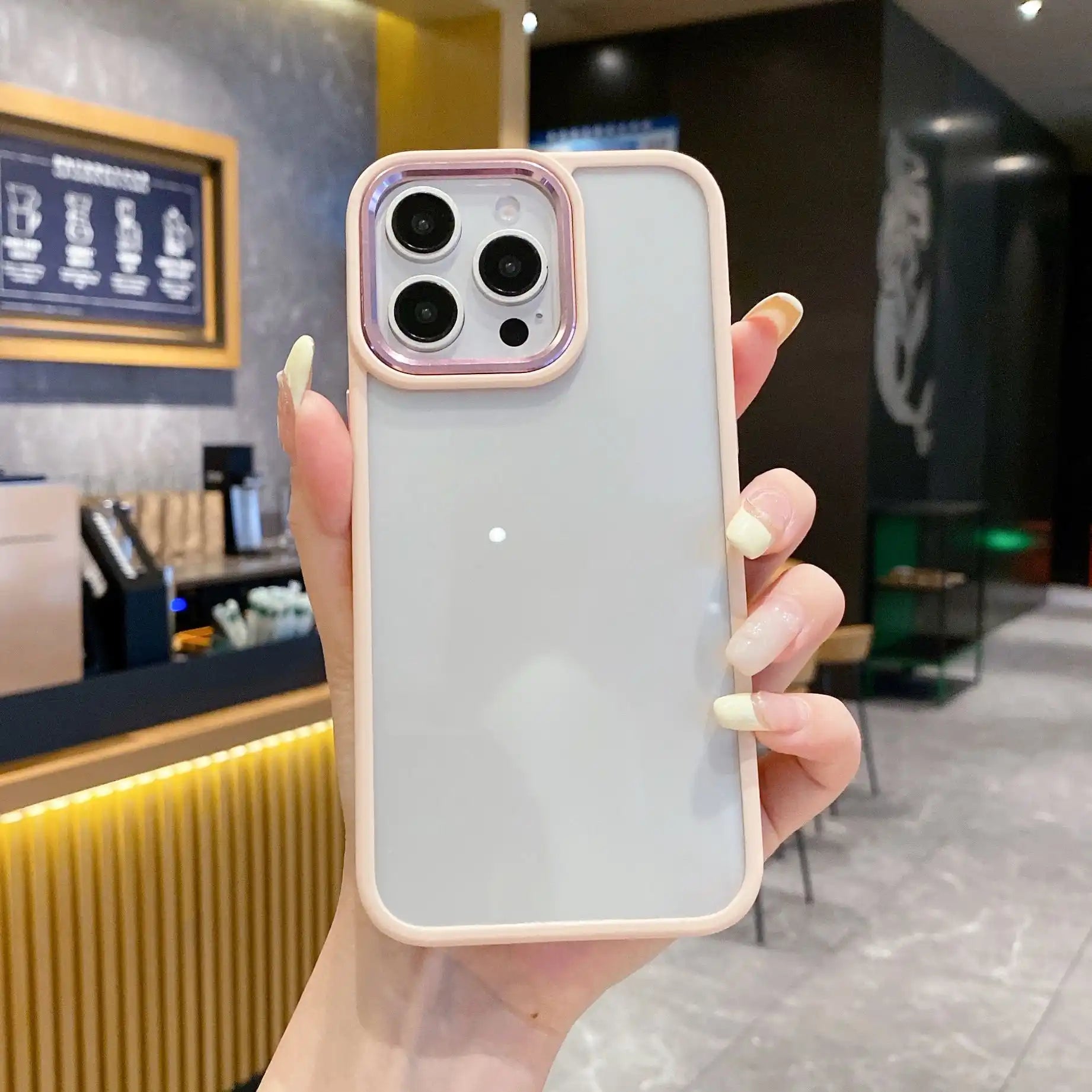 Clear DIY phone case for iPhone with soft pink frame and rose gold-purple camera ring, featuring a frosted back panel, ready for sticker decoration.