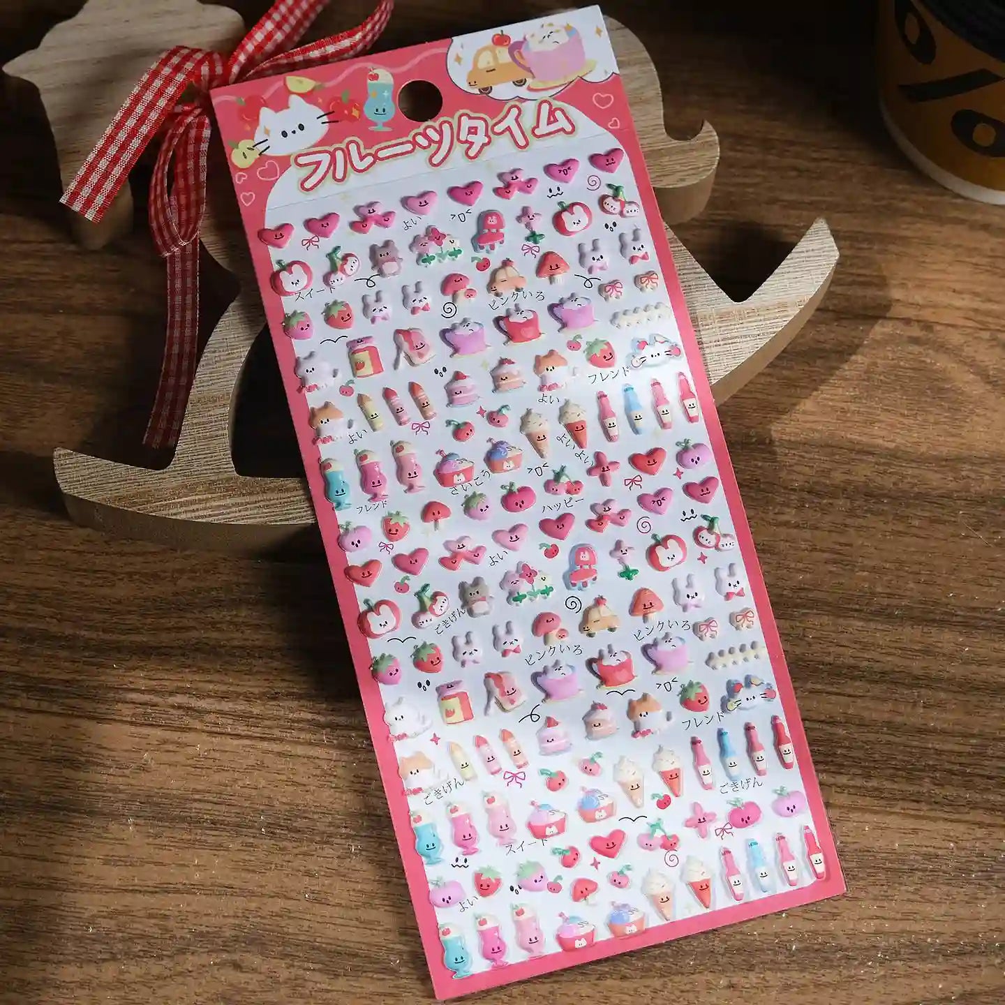 Cute kawaii sticker sheet with glossy pink mini fruit and animal character designs, perfect for DIY phone case decoration.