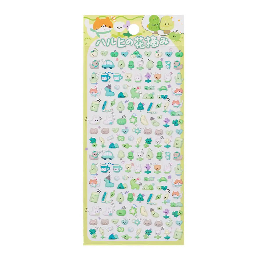 A sheet of pastel green and yellow Japanese kawaii 3D stickers featuring spring outing themes like trees, little cars, and cats for DIY crafting.