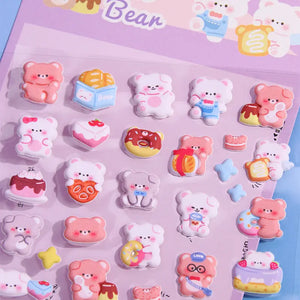 Close-up of 3D puffy "Sweet Bear" stickers, showcasing adorable bear and sweet dessert designs (cake, donut, bread), self-adhesive PVC epoxy stickers

