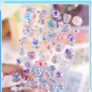 Close-up of 3D crystal clear stickers with cute unicorn, magic wand, and dessert designs, featuring iridescent and glitter effects, self-adhesive PVC epoxy stickers
