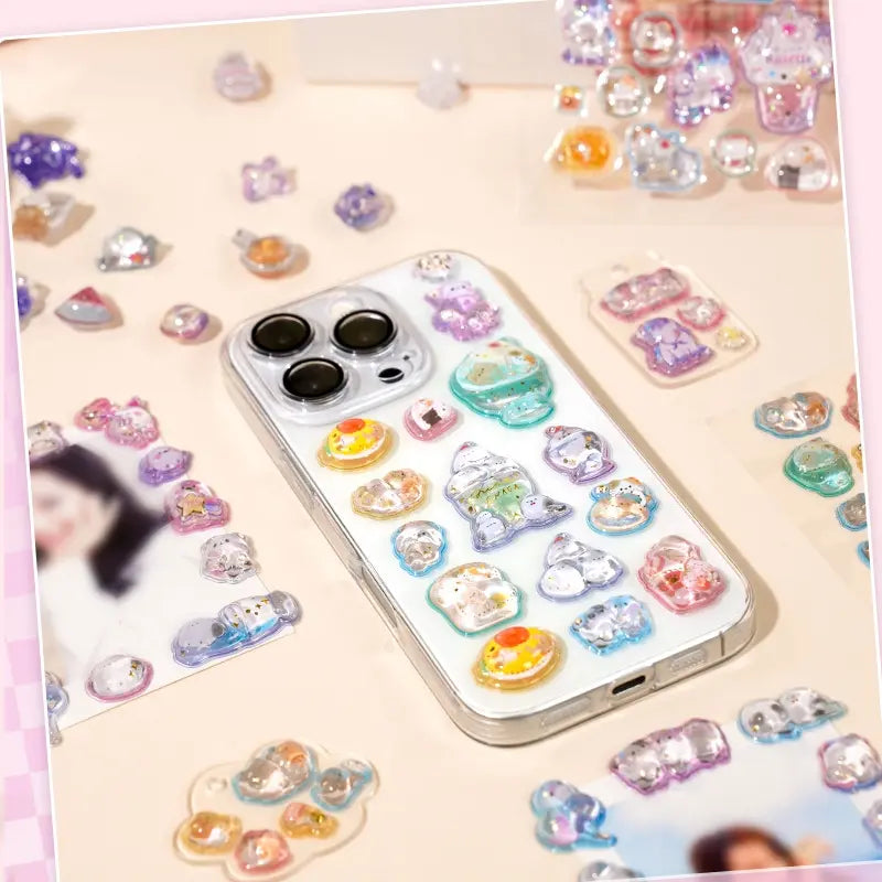 Decorative display of 3D unicorn and pet crystal stickers used for phone case DIY, featuring adorable designs with holographic and glitter effects