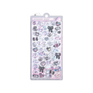 A sheet of "Bonbon Drop" 3D stickers featuring black and purple bows, hearts, and stars for DIY gothic phone case art.